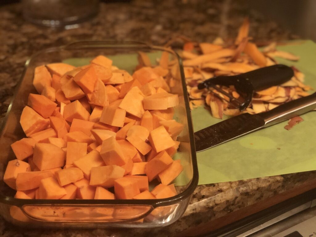 Cut Sweet Potatoes in a glass dish