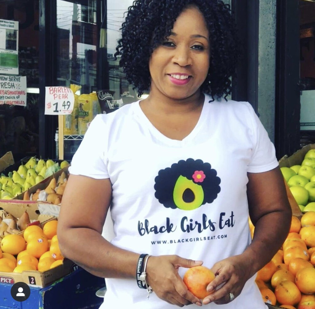 Photo of LA Dunn. She offers plant-based coaching at Black Girls Eat.

