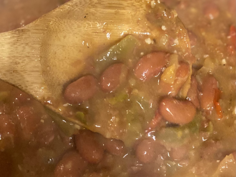 Red Beans in Skillet with peppers, onions and seasonings.