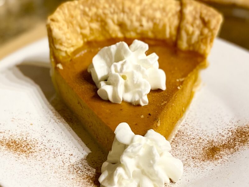 Slice of Pumpkin Pie with Whipped Cream