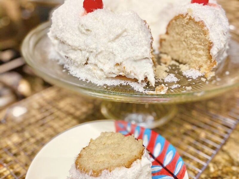 Vegan Pina Colada Cake on a cake plate