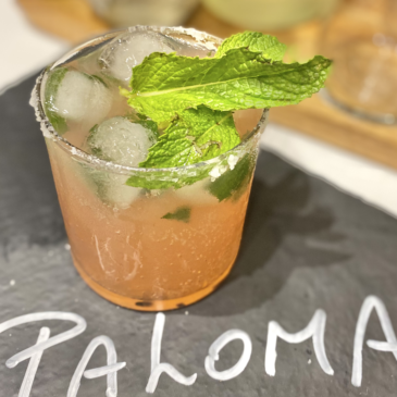 Paloma Drink with Mint and Lime Garnish