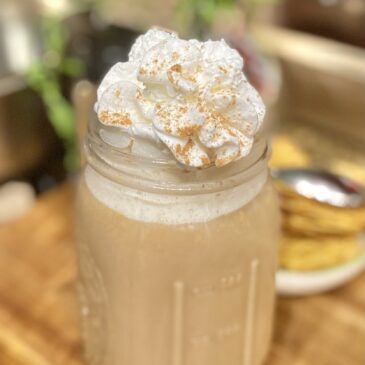 Pumpkin Spice Latte with Whipped Cream on Top in a Mason Jar
