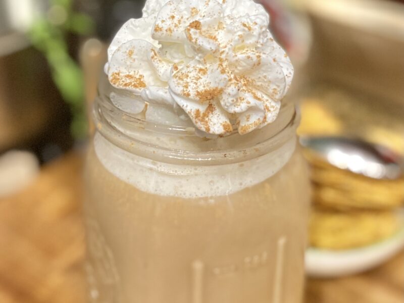 Pumpkin Spice Latte with Whipped Cream on Top in a Mason Jar