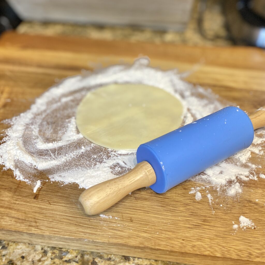 Dough for Empanadas on a Cutting Board