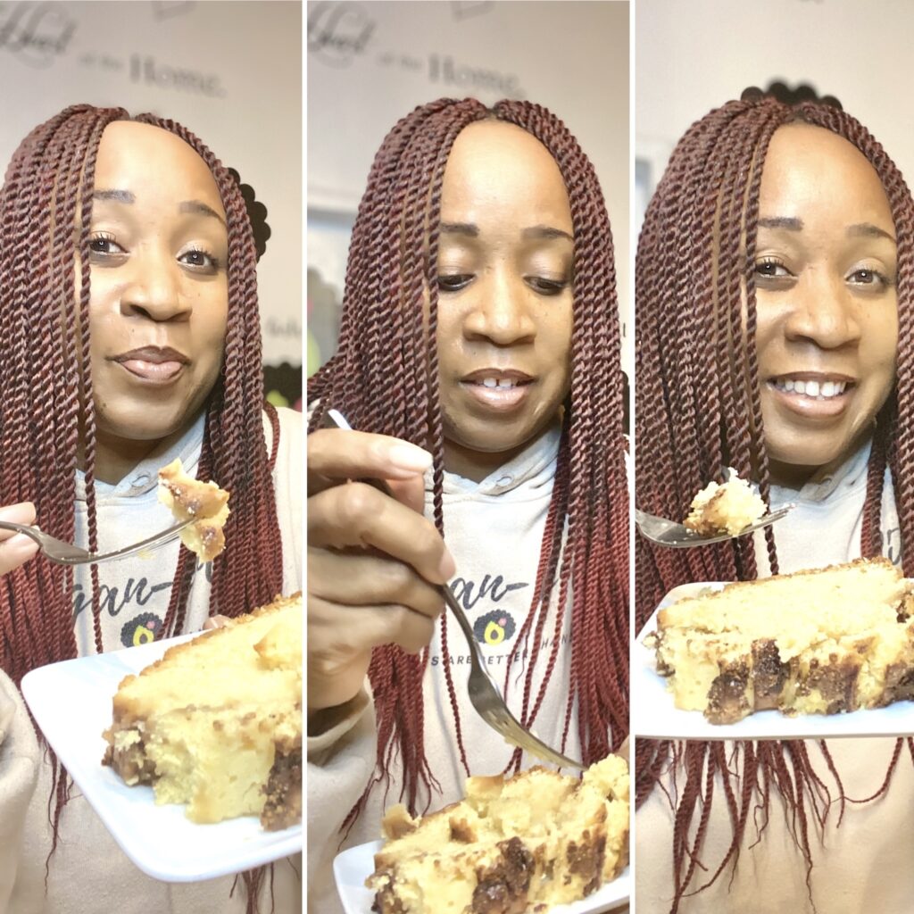 Woman holding a slice of apple cinammon loaf cake