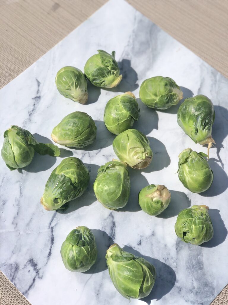 Brussels sprouts on a marble tray