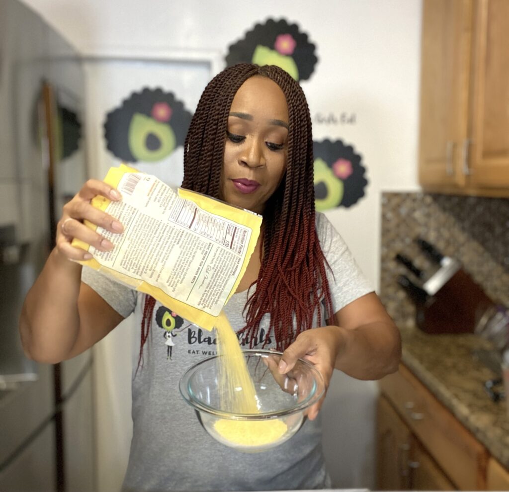 Woman pouring Polenta into a bowl