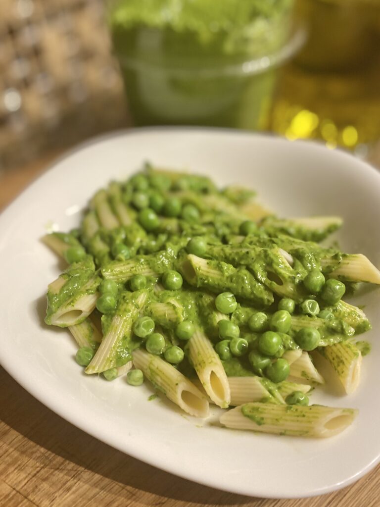 Bowl of penne, snowpeas and pesto
