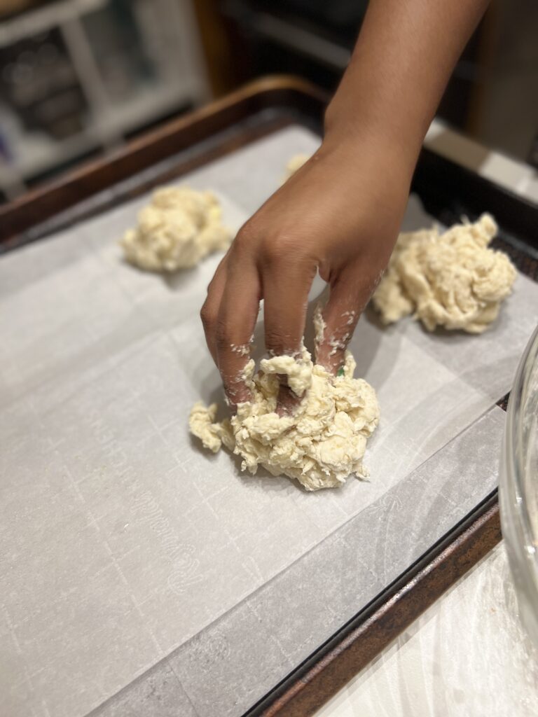 a tray of drop biscuits ready for the oven