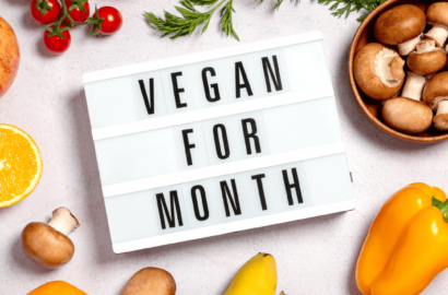 The words Vegan for a Month surrounded by produce