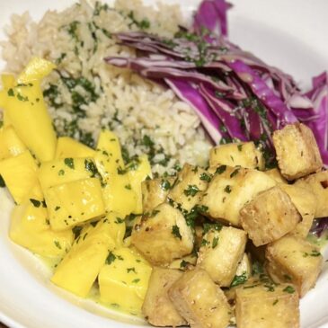 rice bowl with spicy tofu, mango and red cabbage
