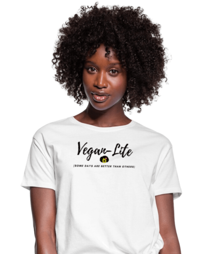 woman in a tshirt that reads "vegan lite" is one of the gift ideas in this post