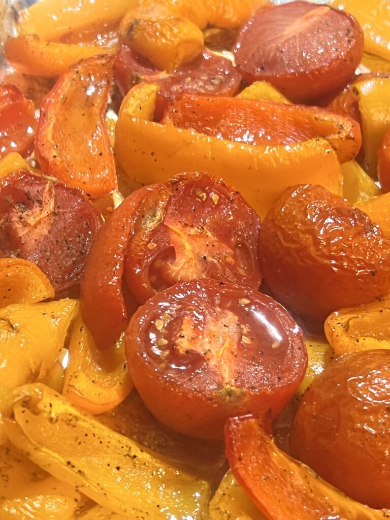 Close up of roasted tomatoes and peppers