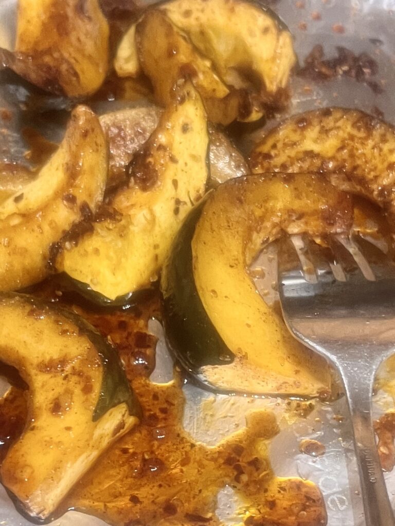 Spicy Maple Acorn Squash on Cookie Sheet