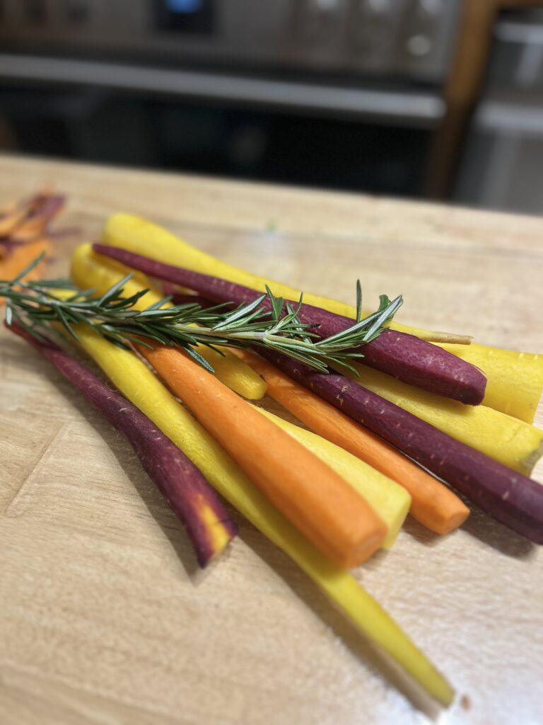 Rainbow carrots are ready for a vegan sheet pan dinner