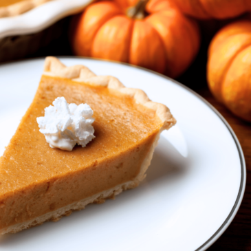 A slice of pumpkin pie on a plate