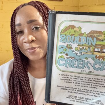 woman with Bouldin Creek Cafe Menu