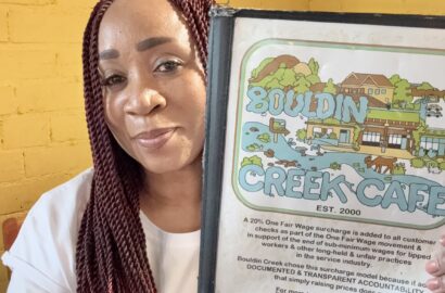 woman with Bouldin Creek Cafe Menu